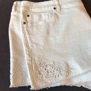 Torrid white denim shorts with embroidery